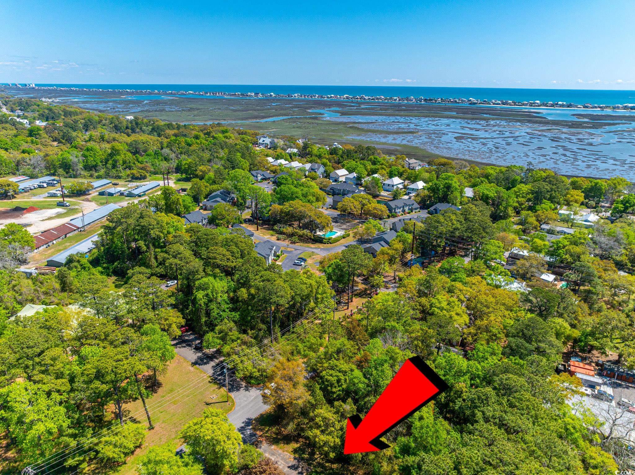675 Mariner Avenue Murrells Inlet, SC 29576 - Photo 23 of 27 Drone / aerial view with a water view