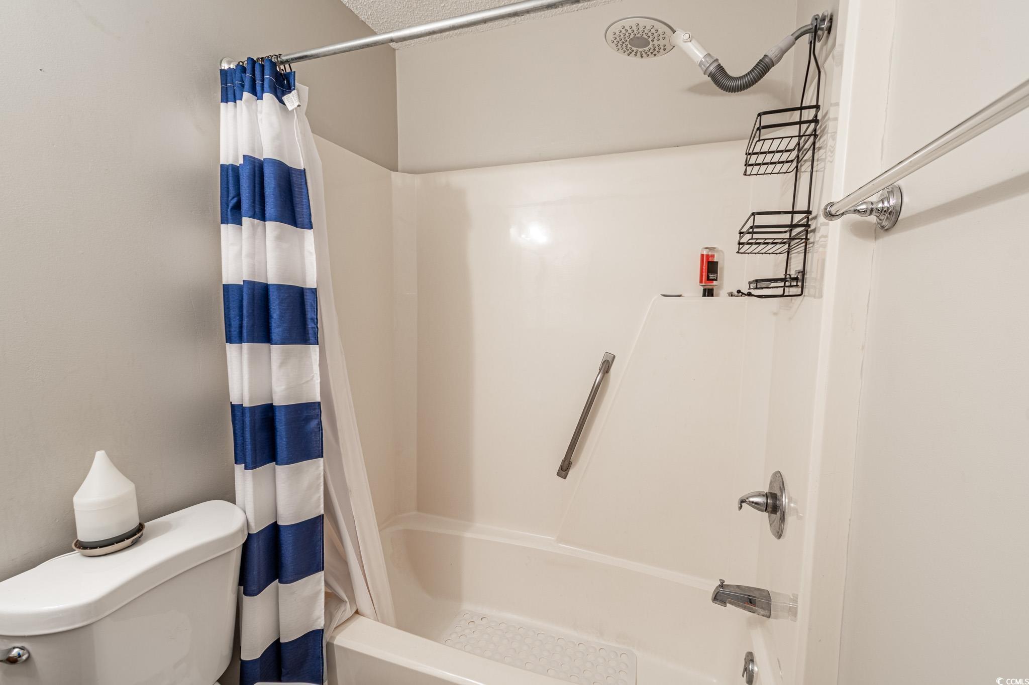 675 Mariner Avenue Murrells Inlet, SC 29576 - Photo 10 of 27 Bathroom with toilet and shower / bath combo