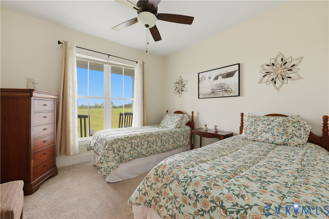 25181 West Soap Stone Road Jetersville, VA 23083 - Photo 25 of 54 Carpeted room with a large window offering expansi