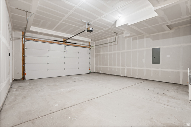 340 East 7635 S Street Sandy, UT 84047 - Photo 24 of 32 Garage featuring electric panel