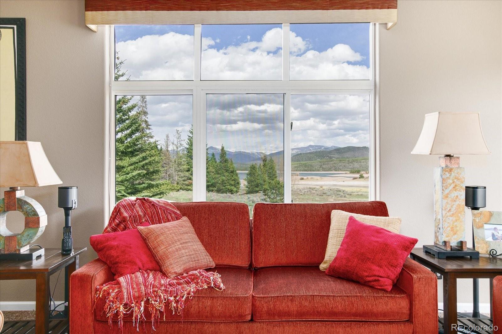 110 Beaver Lodge Road, Unit 101 Frisco, CO 80443 - Photo 3 of 22 a living room with furniture and a large window