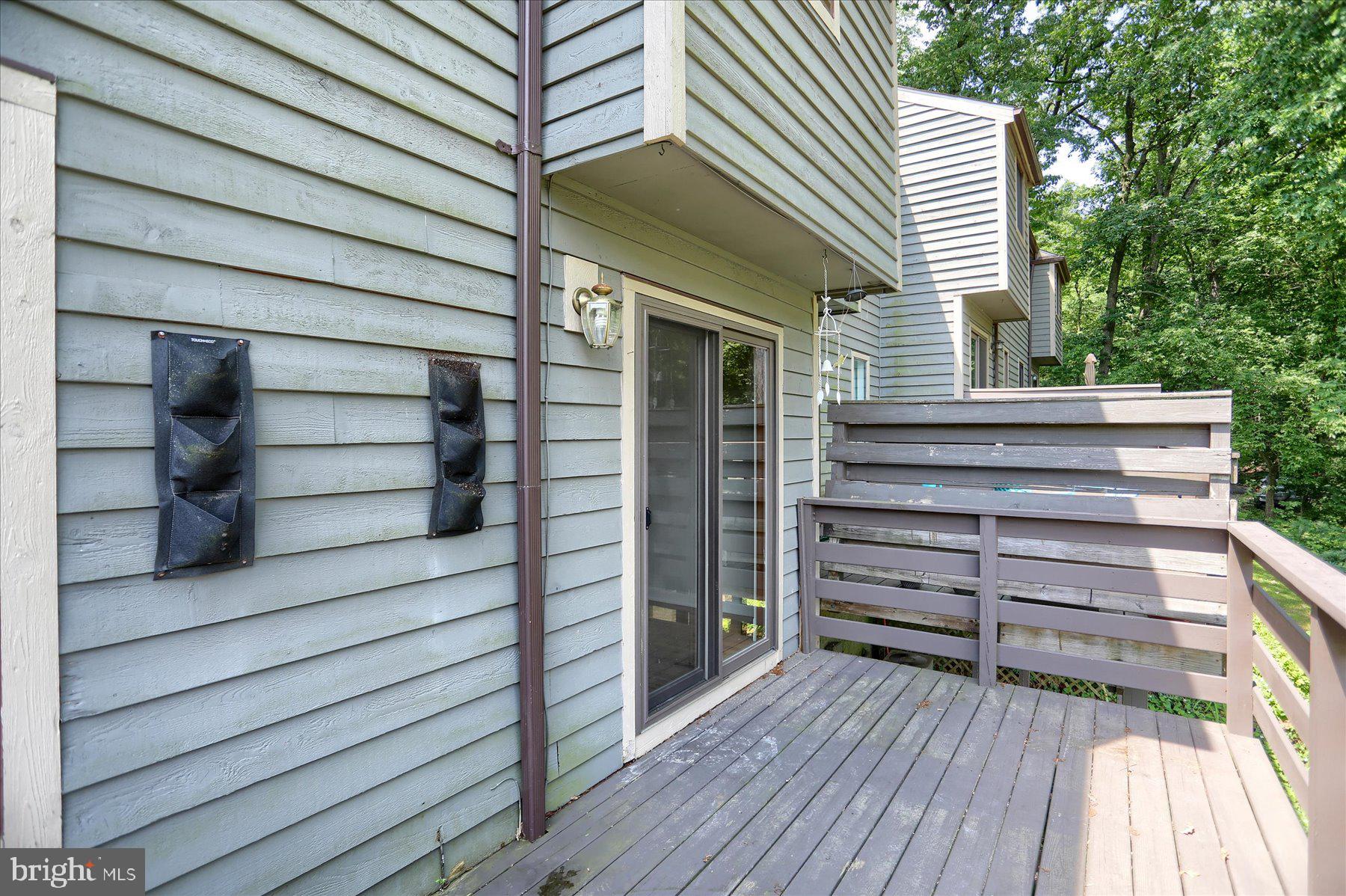 20 Stone Ridge Court, Unit 22 Baltimore, MD 21239 - Photo 22 of 37 Deck off of Living Room
