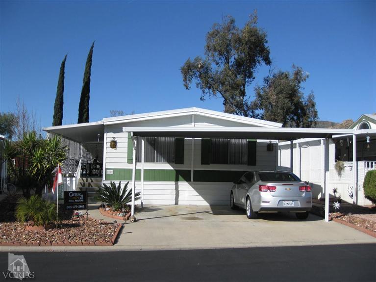 6480 Katherine Road, Unit 10 Simi Valley, CA 93063 - Photo 1 of 20 a car parked in front of a house