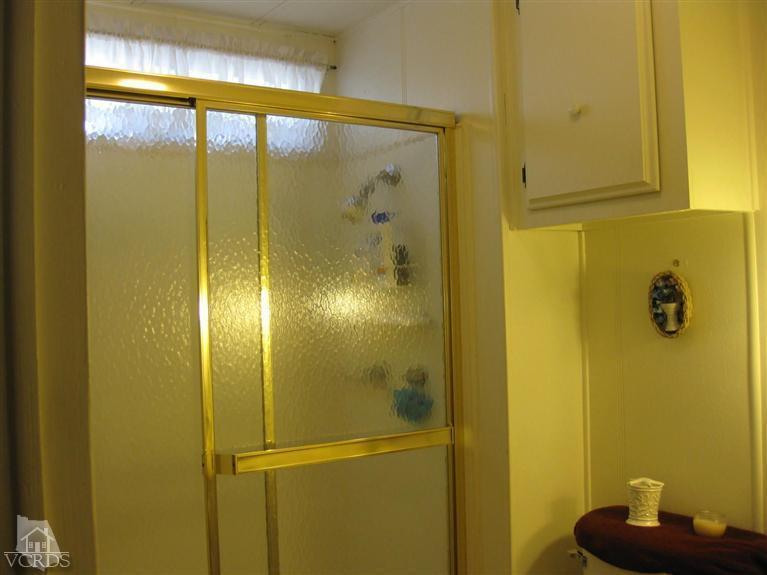 6480 Katherine Road, Unit 10 Simi Valley, CA 93063 - Photo 17 of 20 a bathroom with a shower