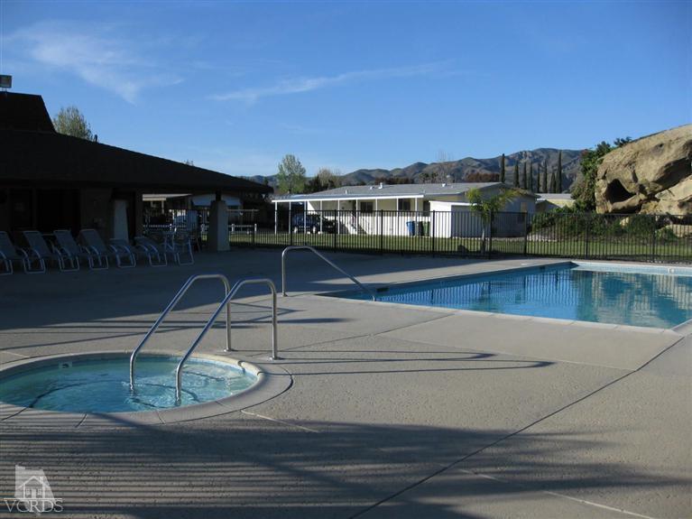 6480 Katherine Road, Unit 10 Simi Valley, CA 93063 - Photo 18 of 20 a view of a house with pool