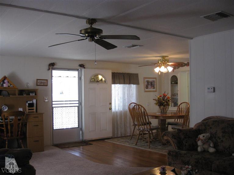 6480 Katherine Road, Unit 10 Simi Valley, CA 93063 - Photo 7 of 20 a dining room with furniture and window