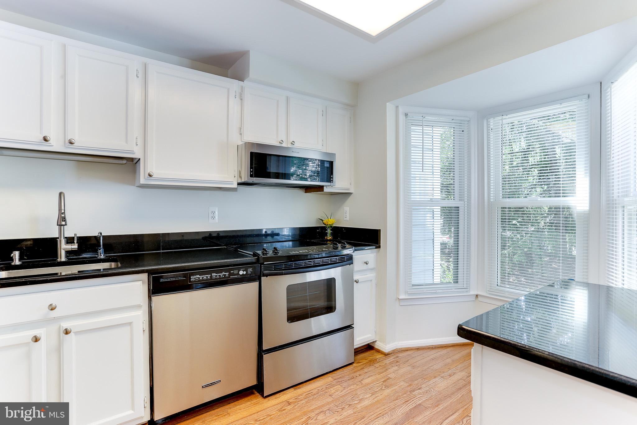 1676 Oaktree Court Reston, VA 20194 - Photo 6 of 30 Kitchen w/Stainless-Steel Appliances
