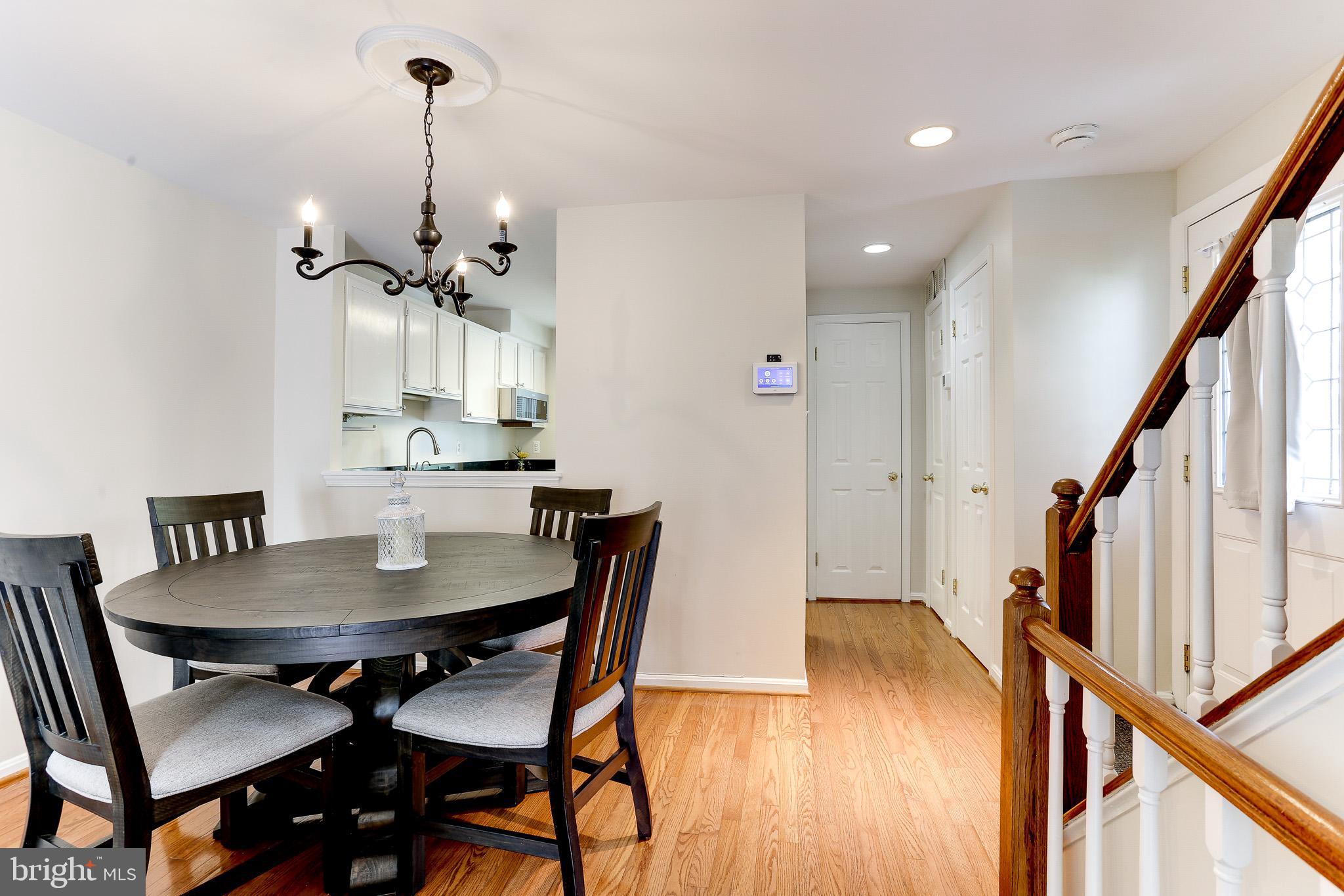 1676 Oaktree Court Reston, VA 20194 - Photo 10 of 30 Hardwood Floor Throughout Main Level