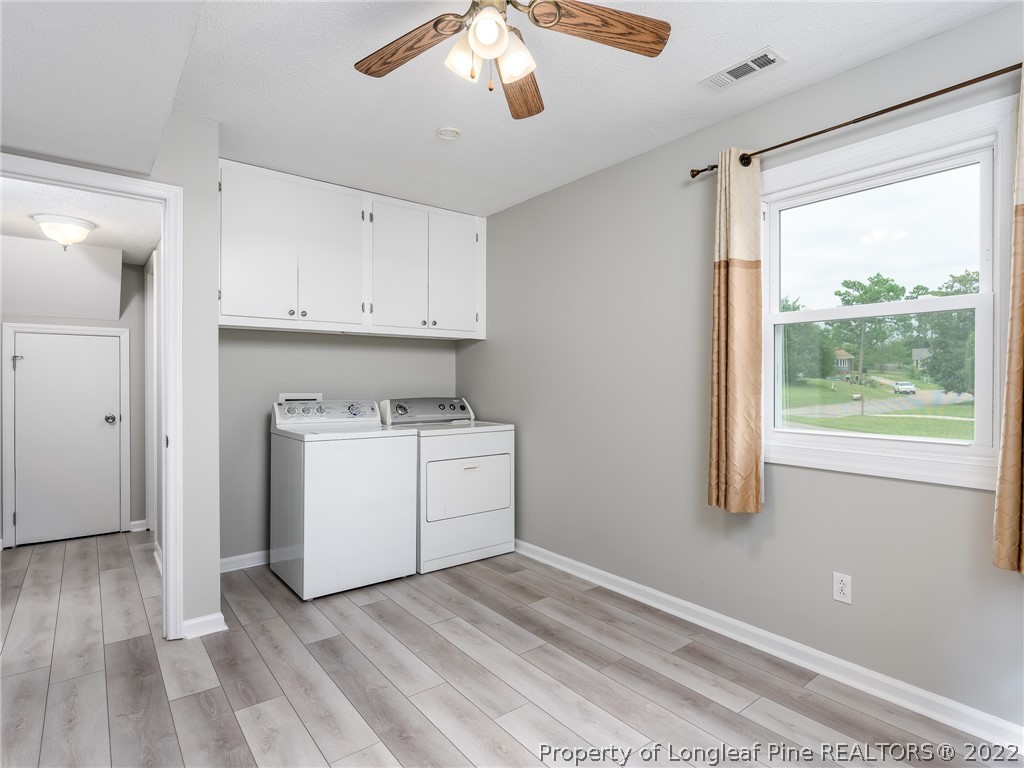 452 Saddle Ridge Road Fayetteville, NC 28311 - Photo 17 of 37 a view of utility room with washer and dryer