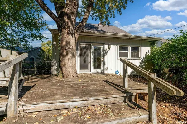 a view of balcony and yard