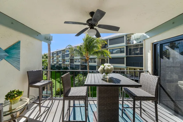 a view of a balcony dining area