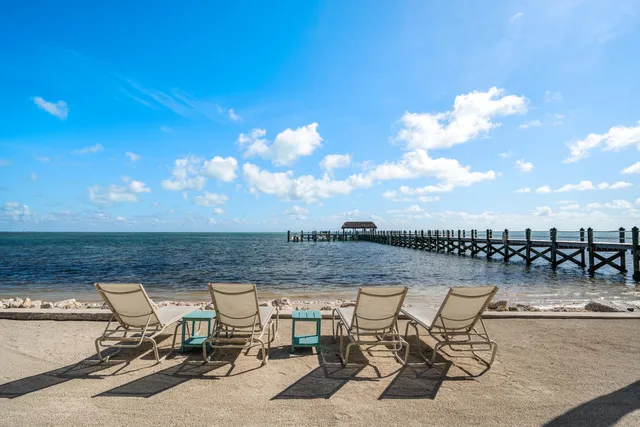 a view of a terrace with sitting area