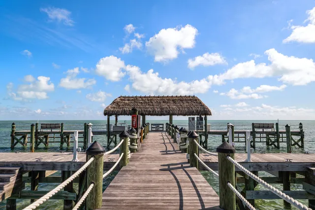 a view of a roof deck with sitting area