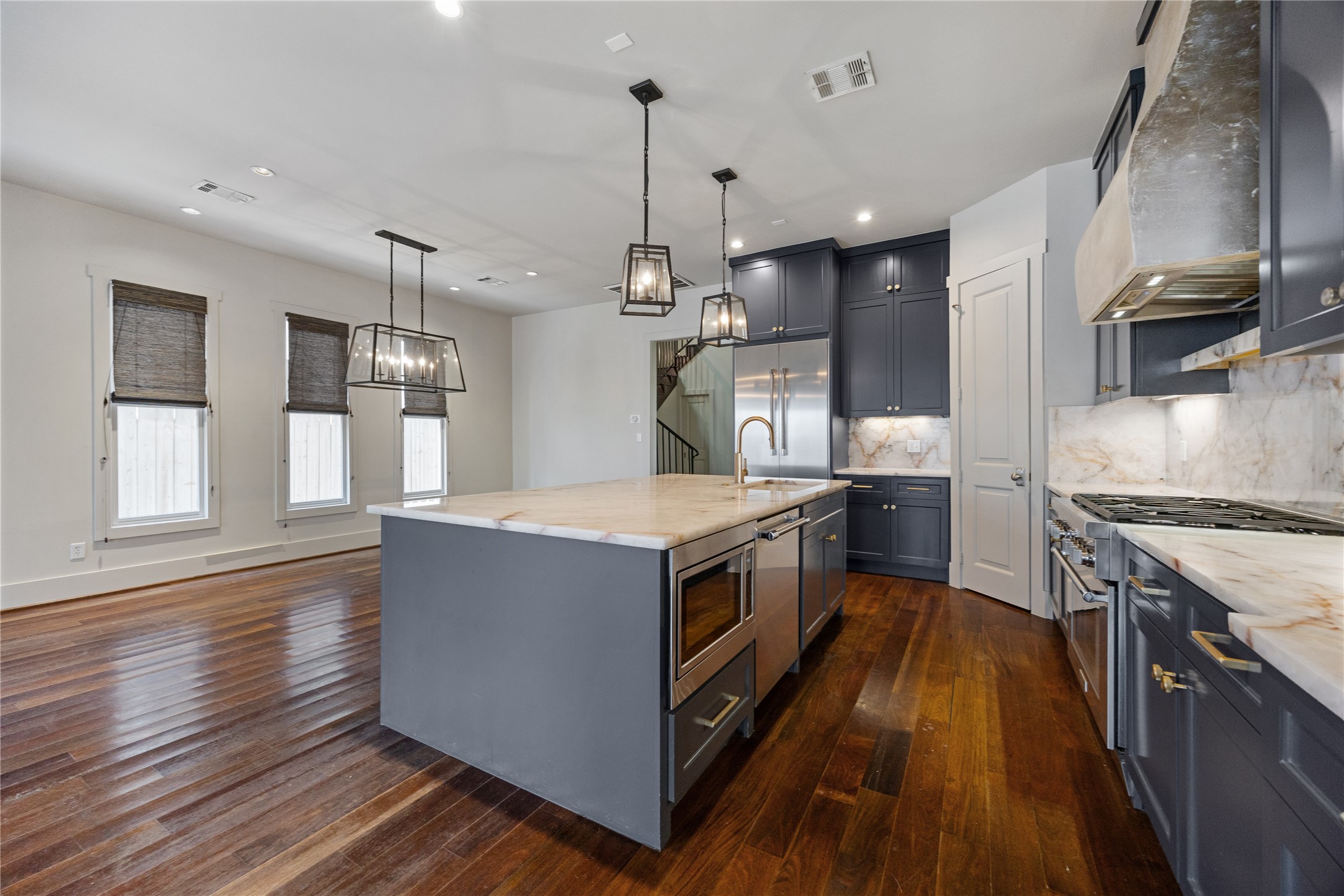926 Nicholson Street Houston, TX 77008 - Photo 9 of 39 Thoughtfully updated kitchen combines timeless finishes with modern functionality. Clever additions like an appliance garage keeps things organized and out of sight.