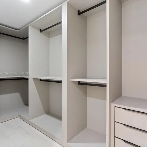 a view of a house with a backyard porch and sitting area