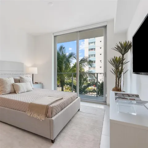 a kitchen with stainless steel appliances a refrigerator and a stove top oven