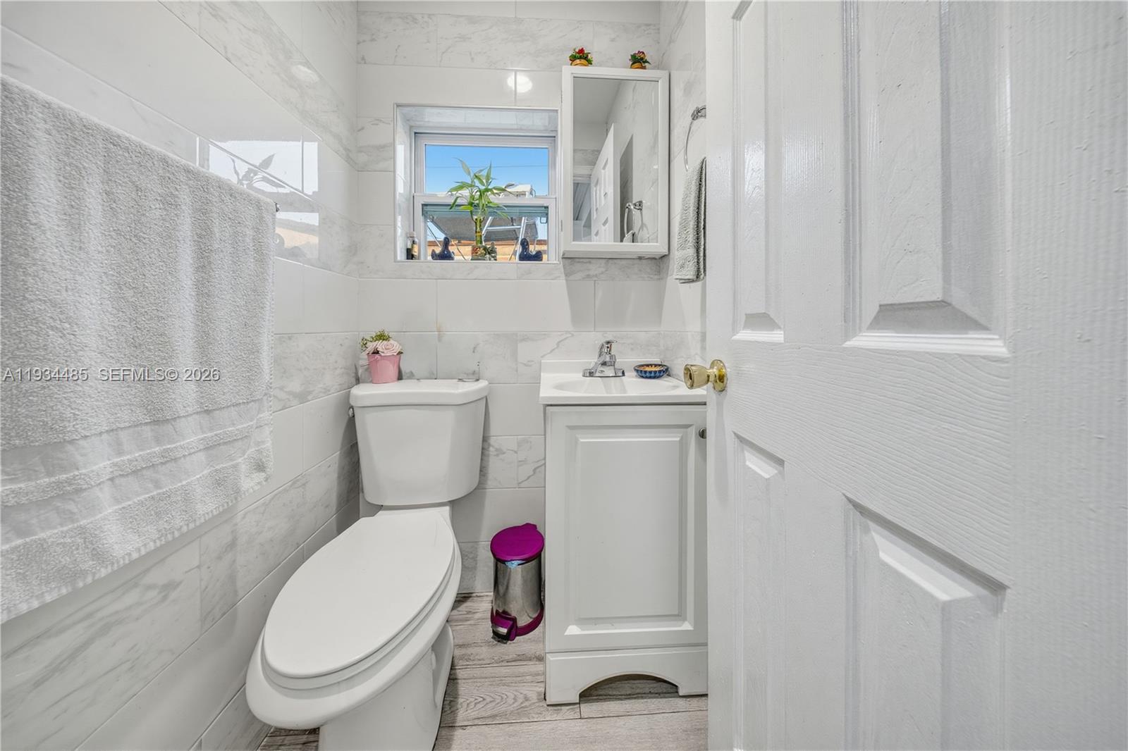 3640 Southwest 92nd Avenue Miami, FL 33165 - Photo 13 of 30 a bathroom with a sink toilet and shower