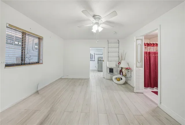 a view of a storage & utility room with wooden floor