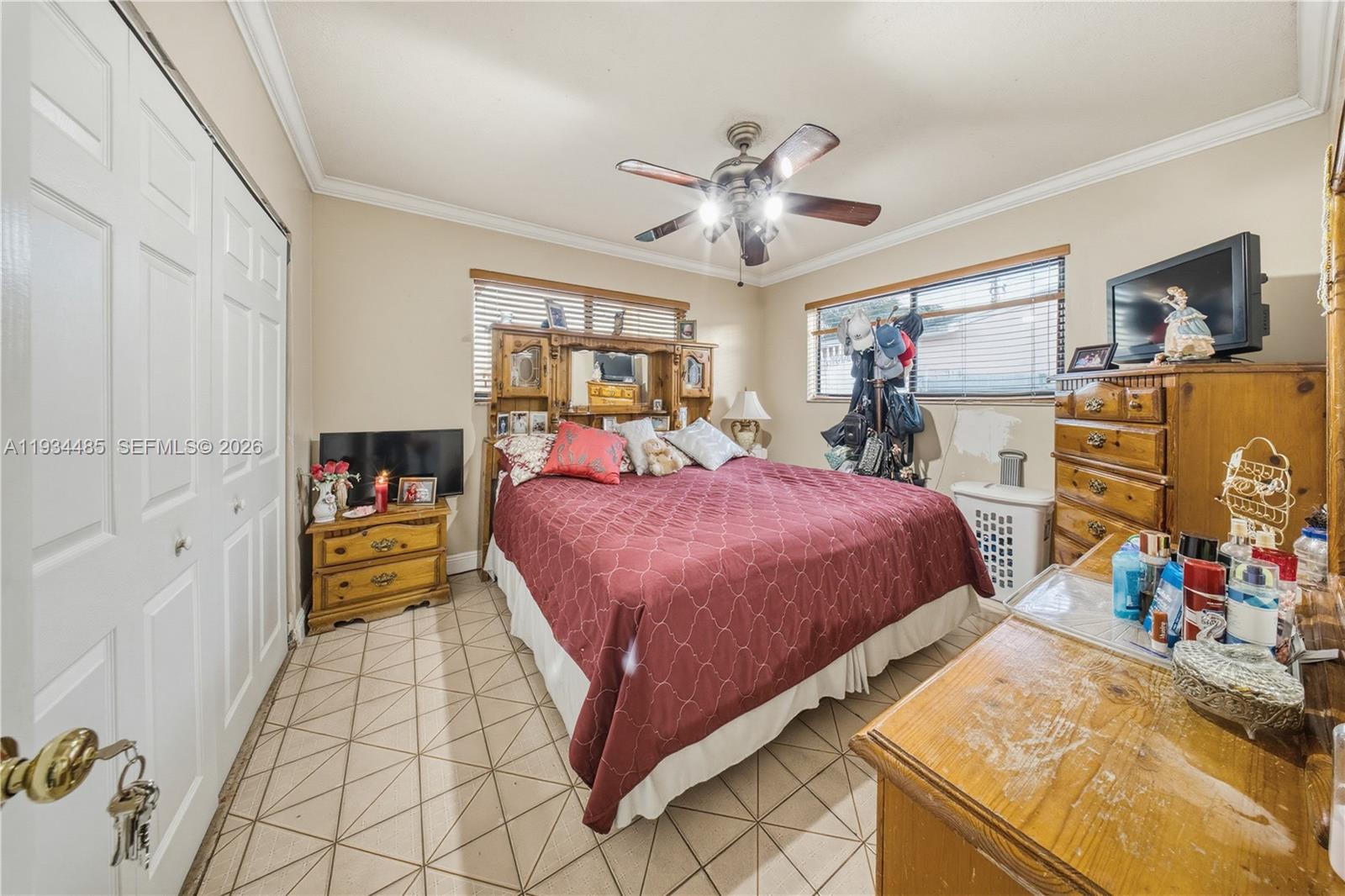 3640 Southwest 92nd Avenue Miami, FL 33165 - Photo 25 of 30 a bed room with a bed and a television