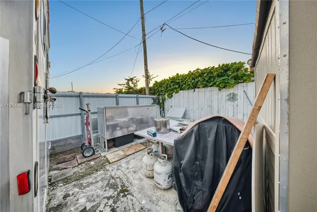 a view of balcony with furniture and wooden deck