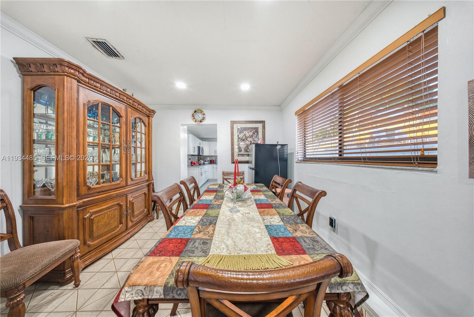 3640 Southwest 92nd Avenue Miami, FL 33165 - Photo 10 of 30 a view of a dining room with furniture window and wooden floor