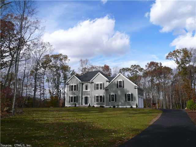 81 Williamsburg Road Haddam, CT 06441 - Photo 1 of 1 a view of house with a big yard and large trees