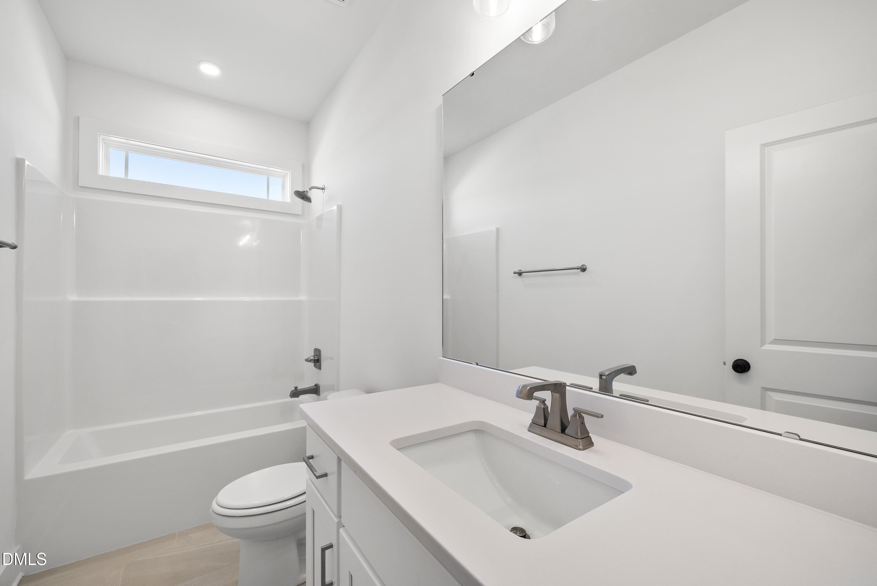 5549 River Buck Rd Spring Spring Hope, NC 27882 - Photo 27 of 35 a bathroom with a sink a toilet and shower