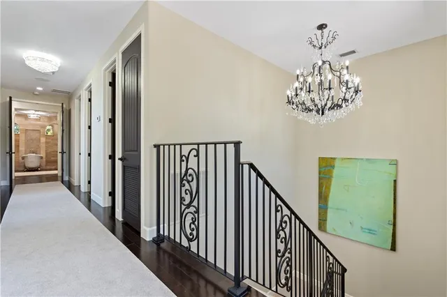 a bed room with furniture and wooden floor