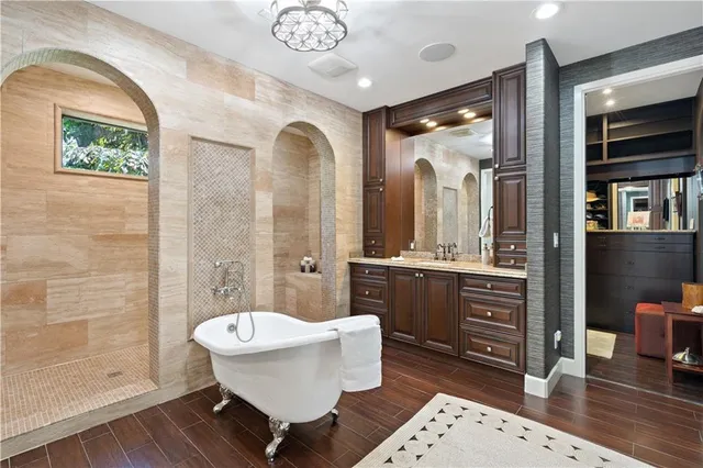 a view of a patio with couches and a potted plant