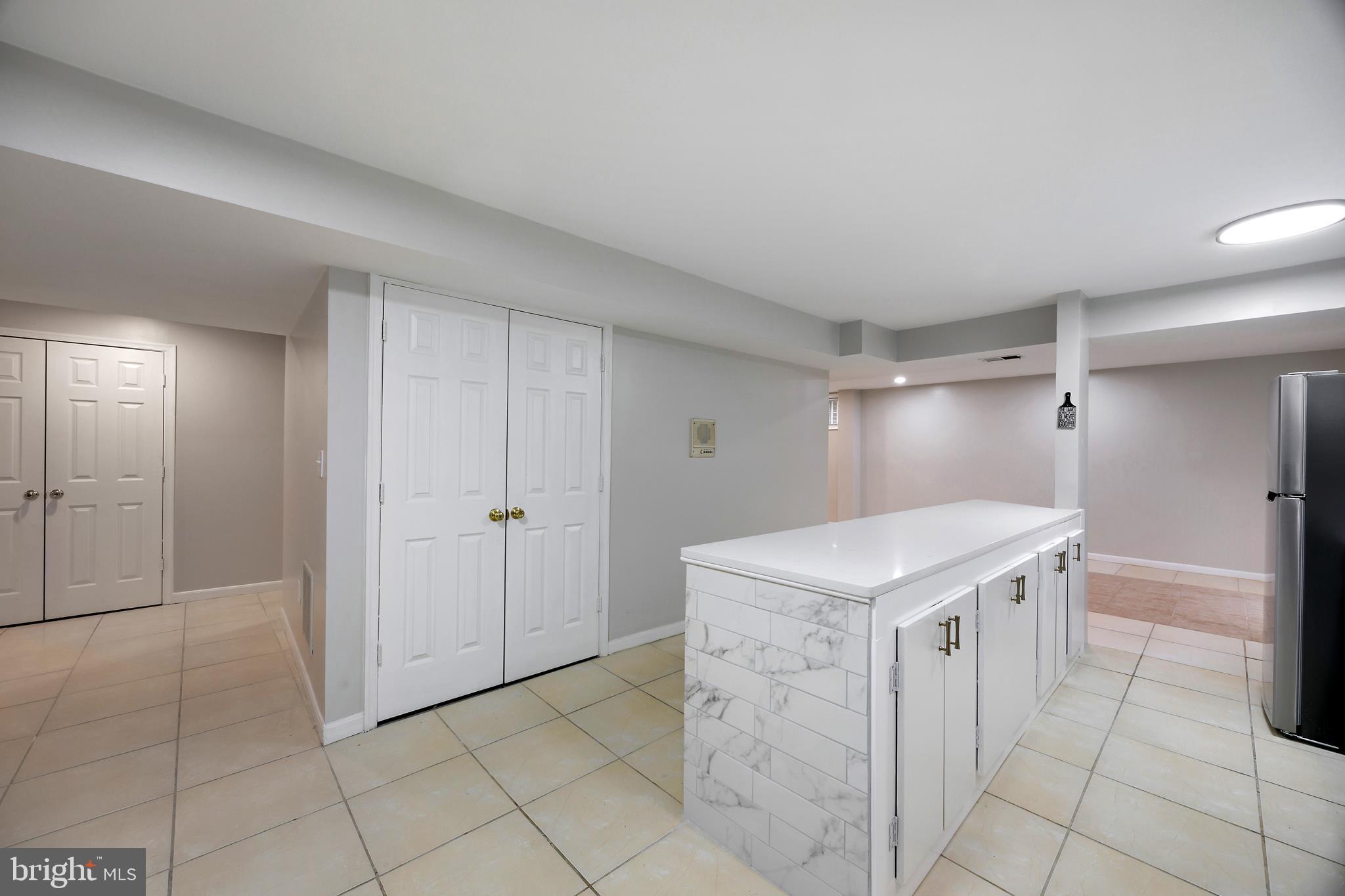 16729 Queen Anne Road Upper Marlboro, MD 20774 - Photo 12 of 29 a kitchen with a cabinets and a sink