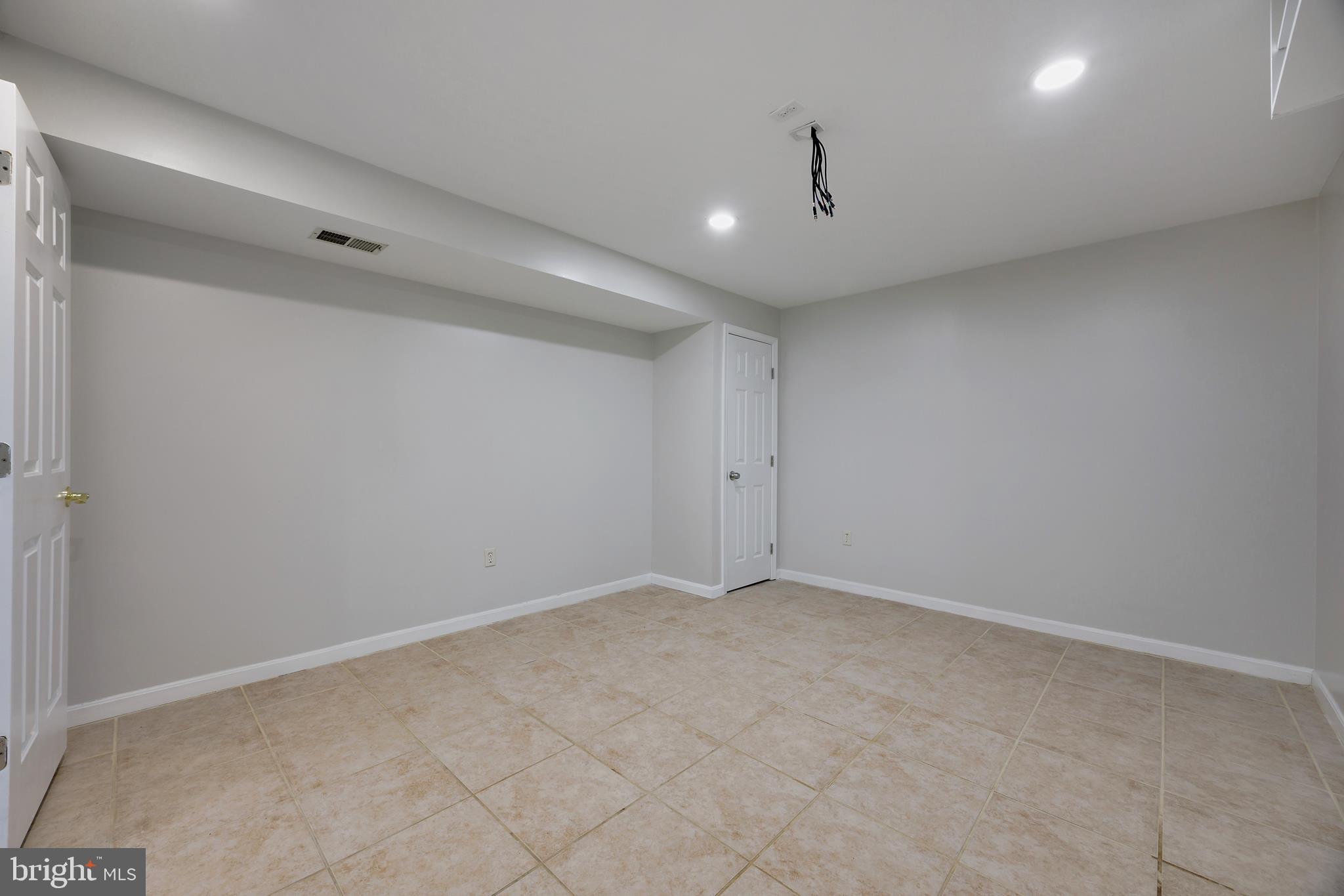 16729 Queen Anne Road Upper Marlboro, MD 20774 - Photo 15 of 29 a view of an empty room