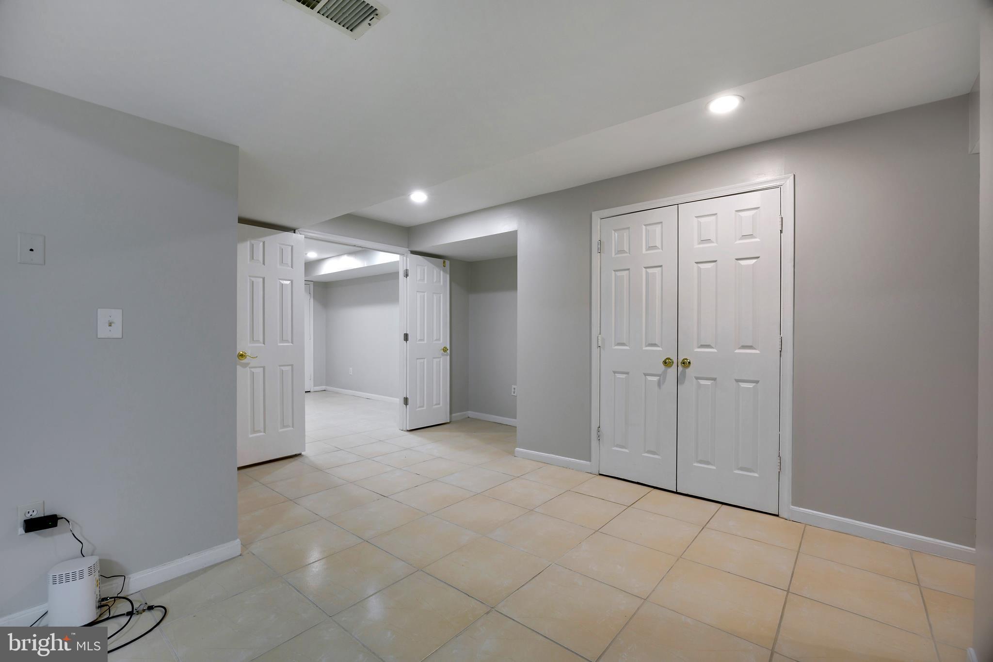 16729 Queen Anne Road Upper Marlboro, MD 20774 - Photo 20 of 29 a view of an empty room