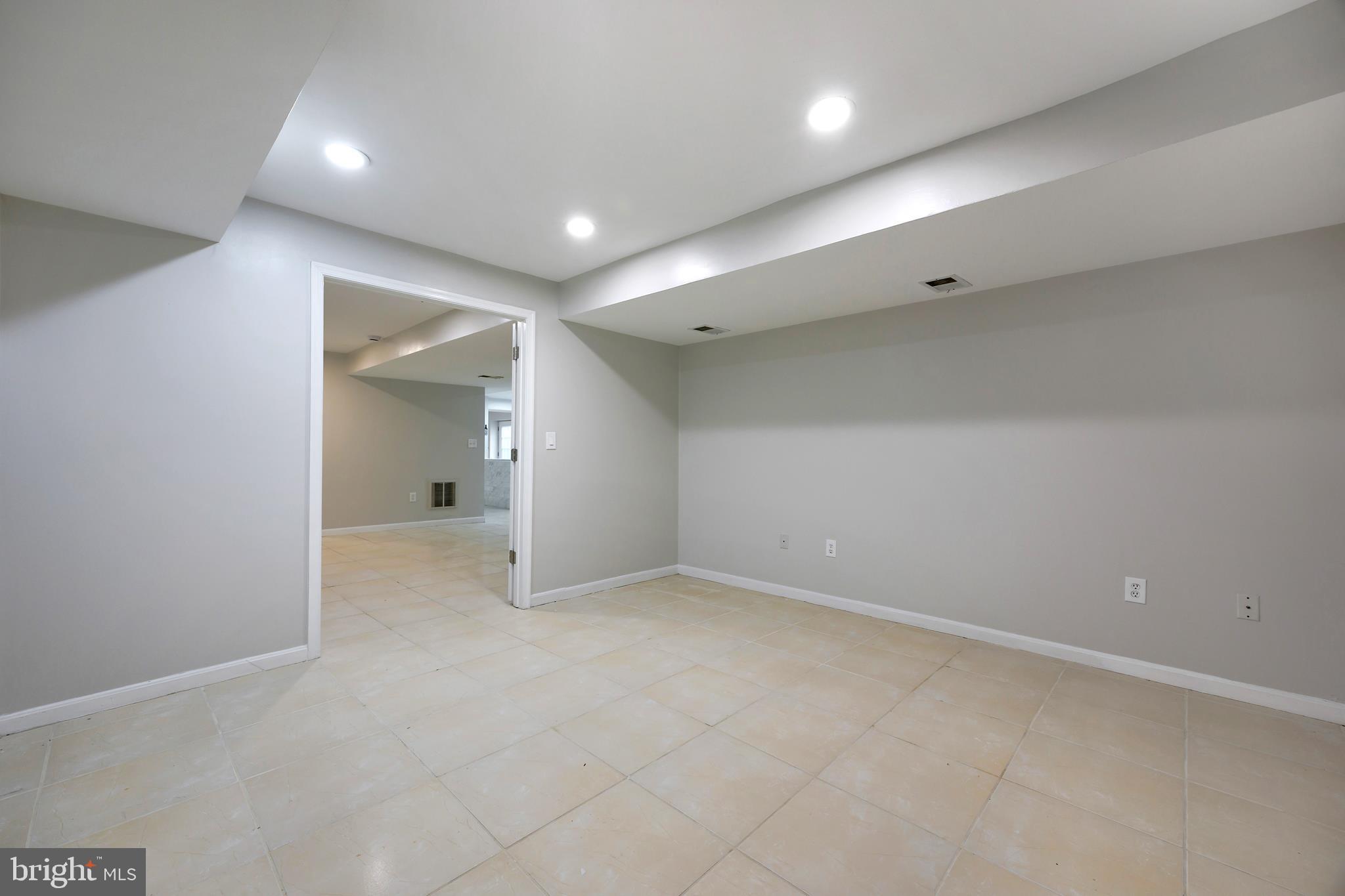 16729 Queen Anne Road Upper Marlboro, MD 20774 - Photo 23 of 29 an empty room with an entryway