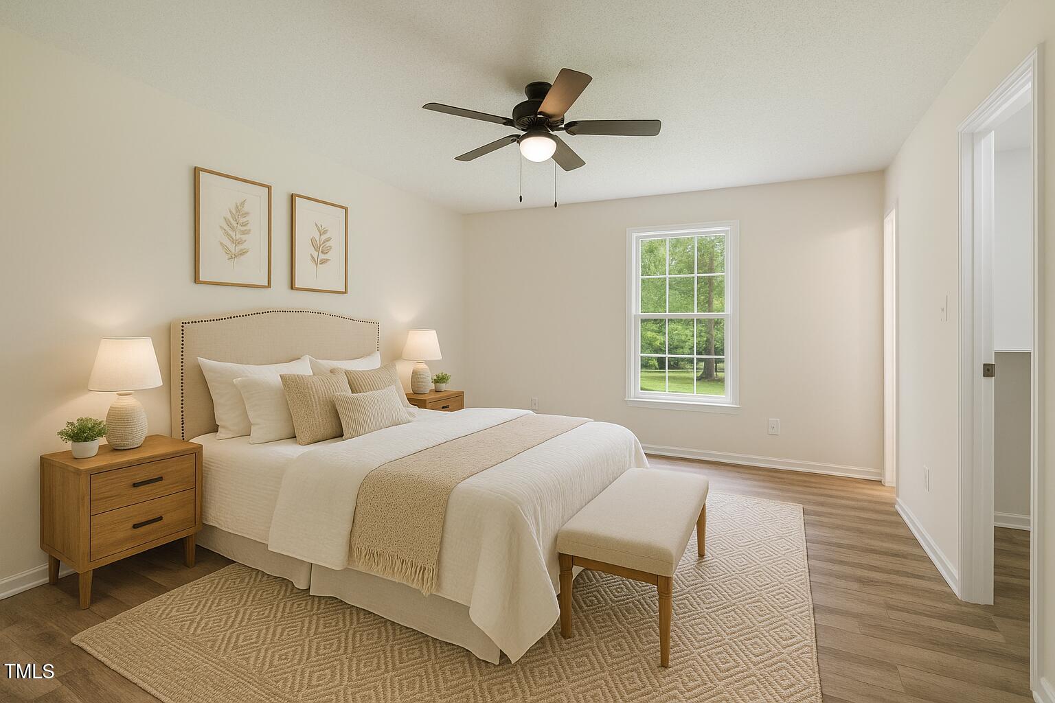 856 Williams-White Road Zebulon, NC 27597 - Photo 10 of 38 a bedroom with a bed and a window