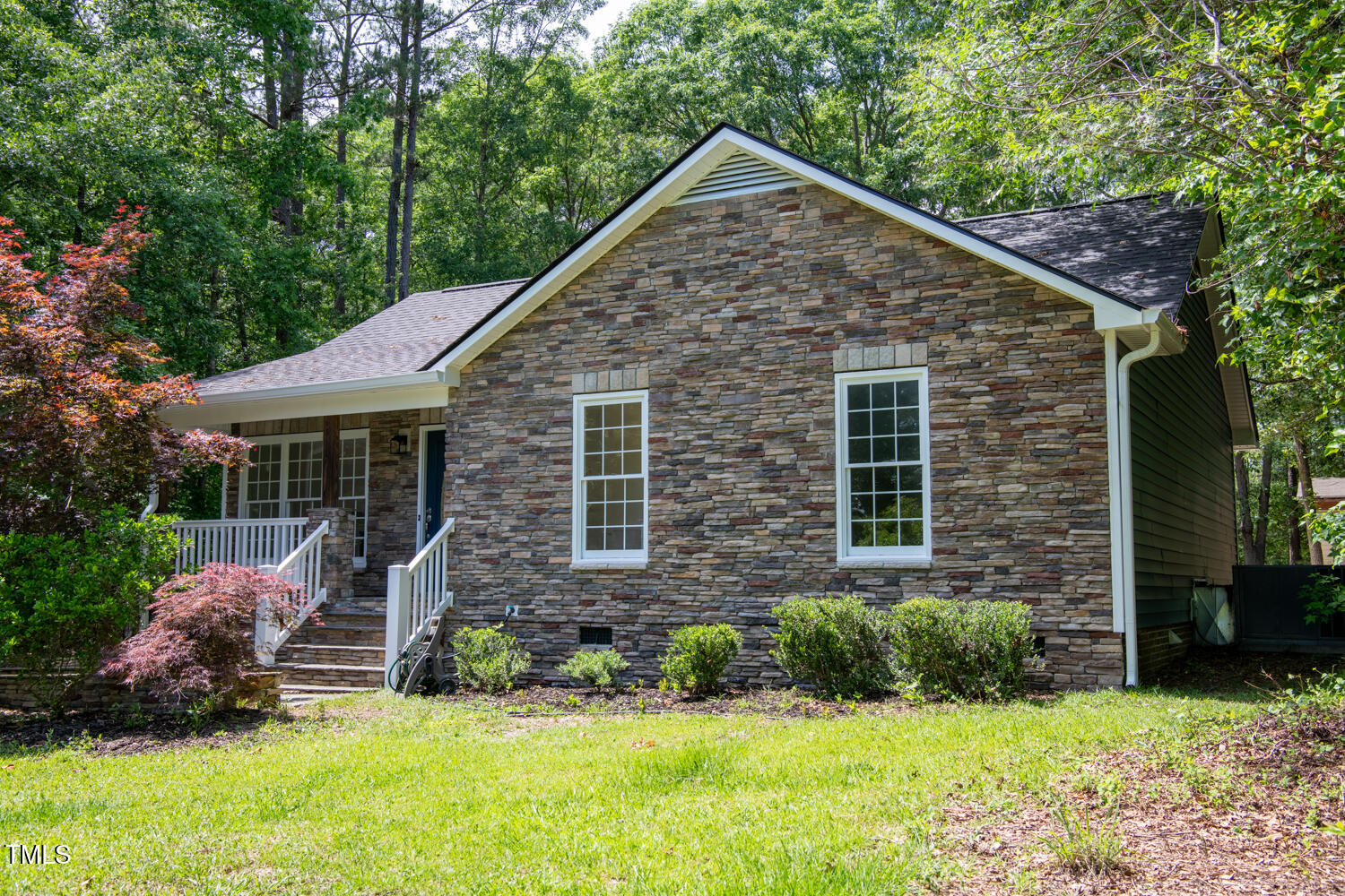 856 Williams-White Road Zebulon, NC 27597 - Photo 2 of 38 a front view of a house with a yard