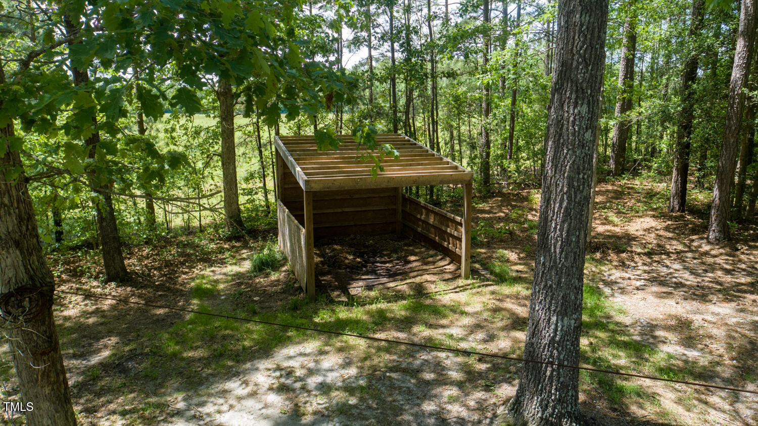 856 Williams-White Road Zebulon, NC 27597 - Photo 36 of 38 a view of a backyard with sitting area