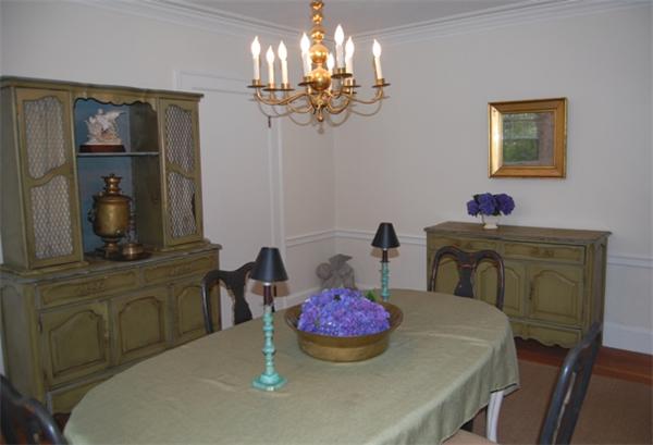 25 Winthrop Road Lexington, MA 02421 - Photo 9 of 16 a dining room with furniture and chandelier