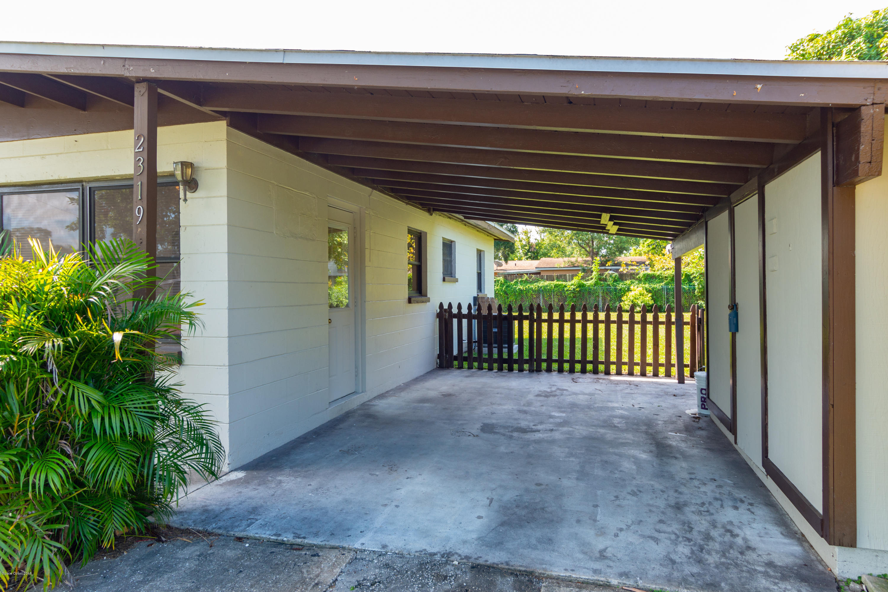 2319 St Dunston Lane Melbourne, FL 32935 - Photo 2 of 29 Car Port