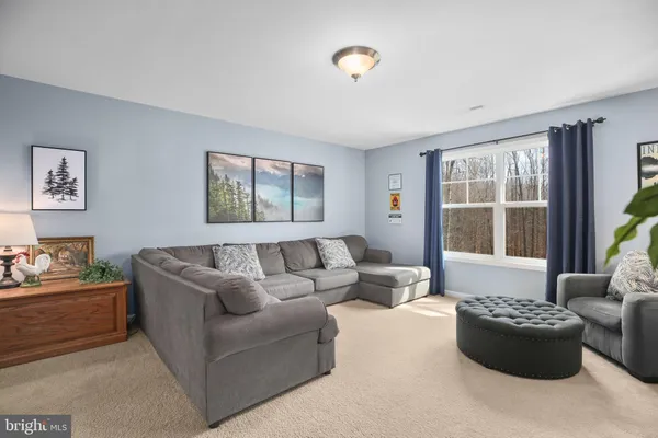 a workspace with furniture and window