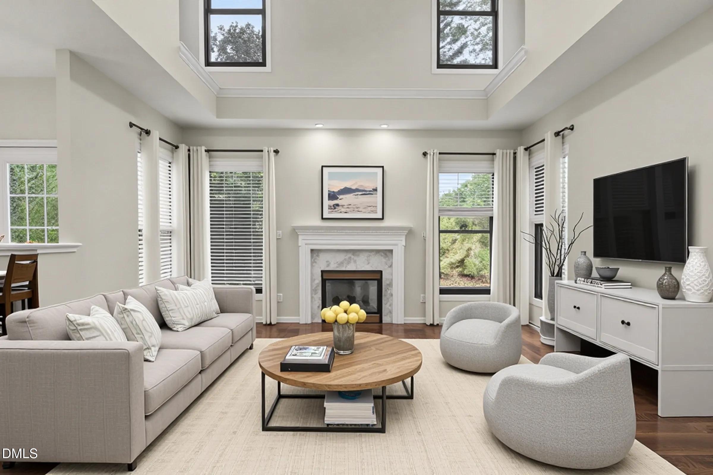 1001 Denfield Court Raleigh, NC 27615 - Photo 2 of 44 a living room with furniture fireplace and window