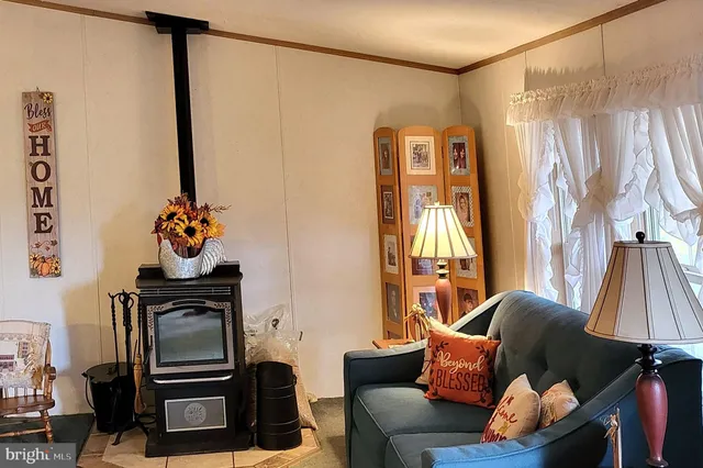 a living room with a fireplace