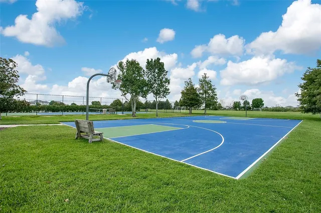 a view of a golf course with a lake