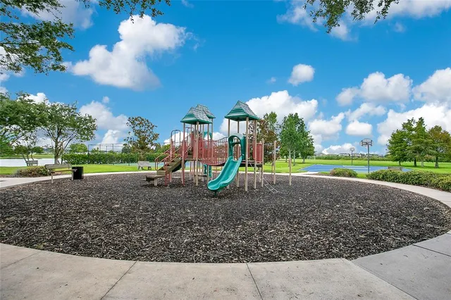 a view of sign board with flower around