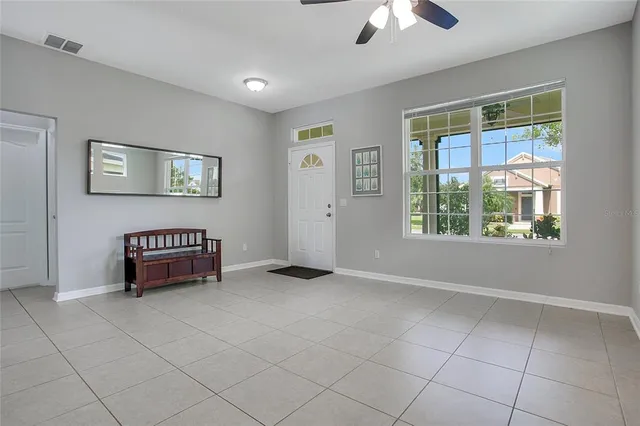 a view of an empty room with a window