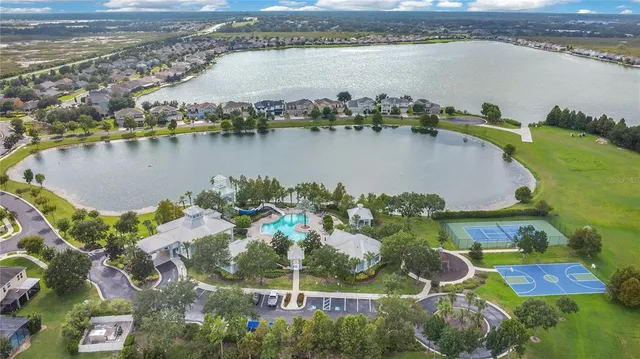 an aerial view of a house having yard