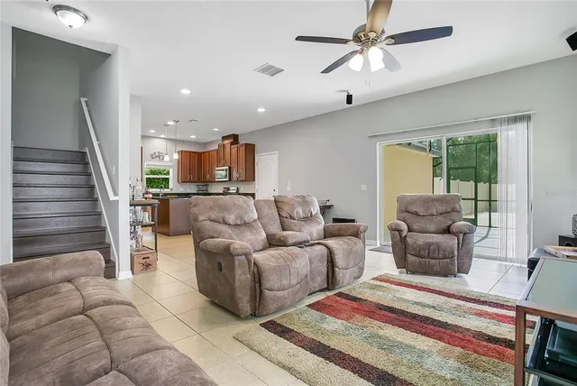a kitchen with a stove a sink a counter top space and appliances