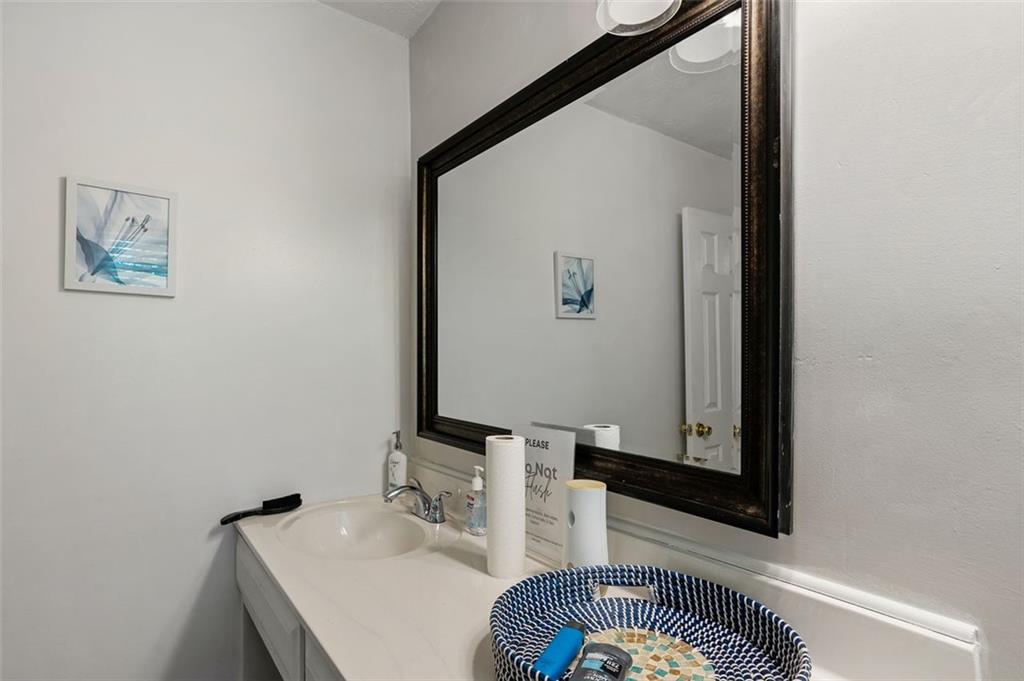 3501 Wesley Chapel Road Decatur, GA 30034 - Photo 11 of 20 a bathroom with a sink and a mirror