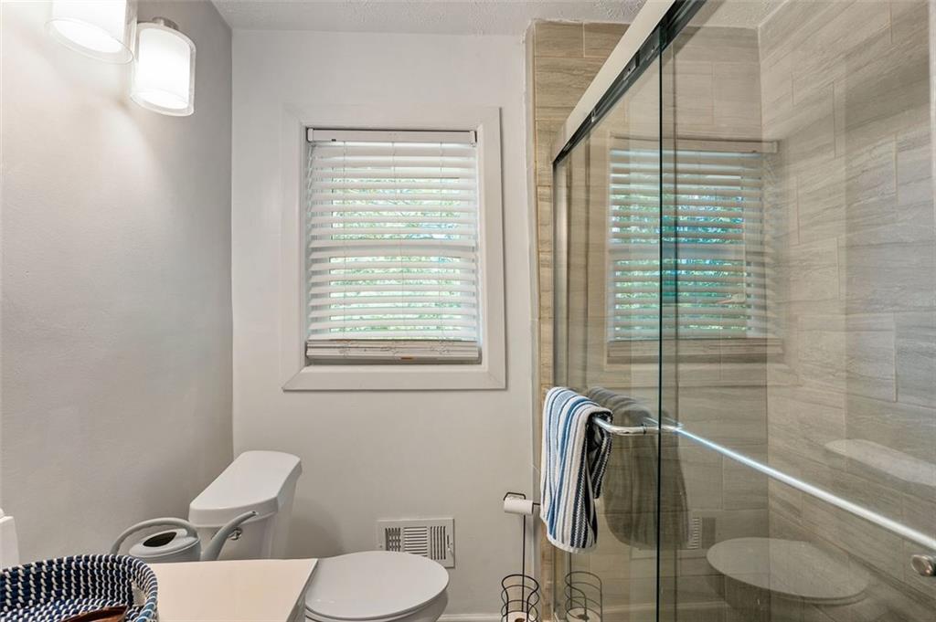 3501 Wesley Chapel Road Decatur, GA 30034 - Photo 12 of 20 a bathroom with a toilet and a sink