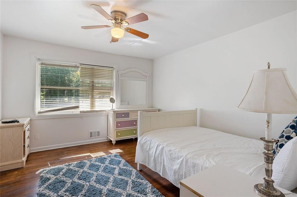 3501 Wesley Chapel Road Decatur, GA 30034 - Photo 15 of 20 a bedroom with a bed and a window