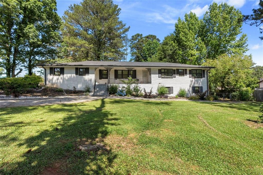 3501 Wesley Chapel Road Decatur, GA 30034 - Photo 20 of 20 a view of a house with backyard and sitting area